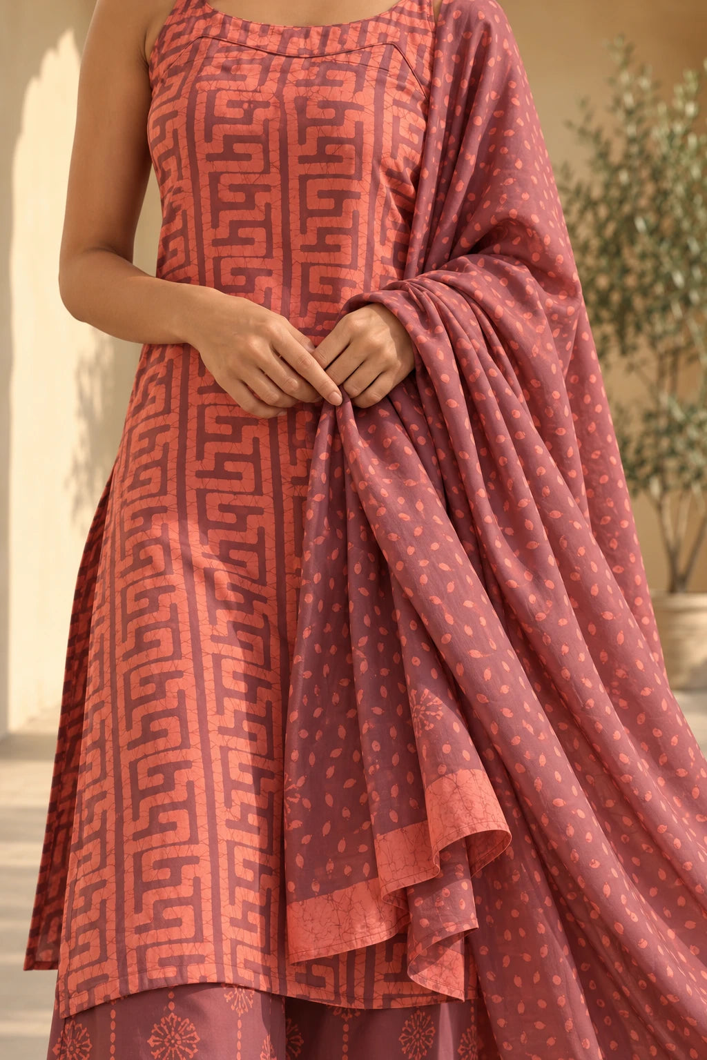 Plum batik dupatta with coral dot print and border, draped over kurta, SOY