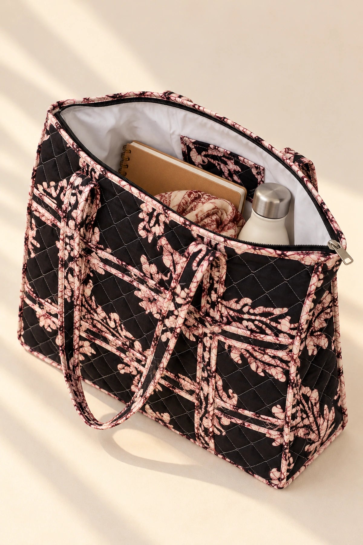 Quilted Batik Tote Bag in Black Blush Leaf print – open, showing the lined interior | Shades of You