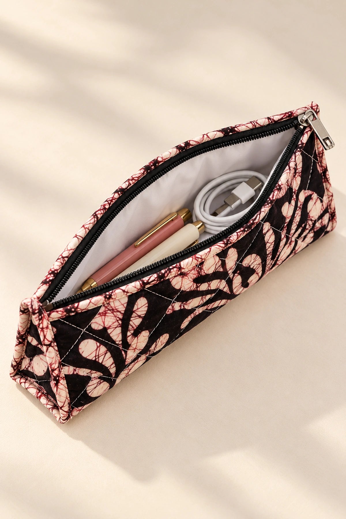 Quilted Batik Utility Pouch in Black Blush Leaf print – open, showing the lined interior | Shades of You