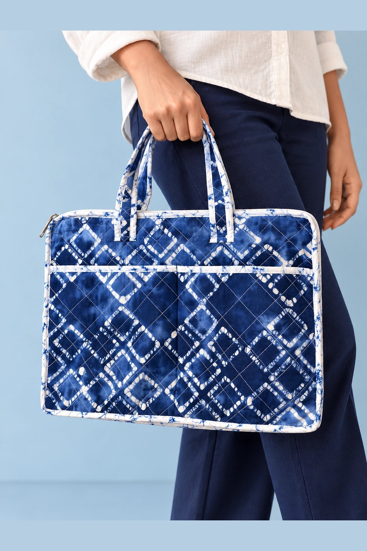 Quilted Batik Laptop Bag in Blue Shibori Check print – held in hand | Shades of You