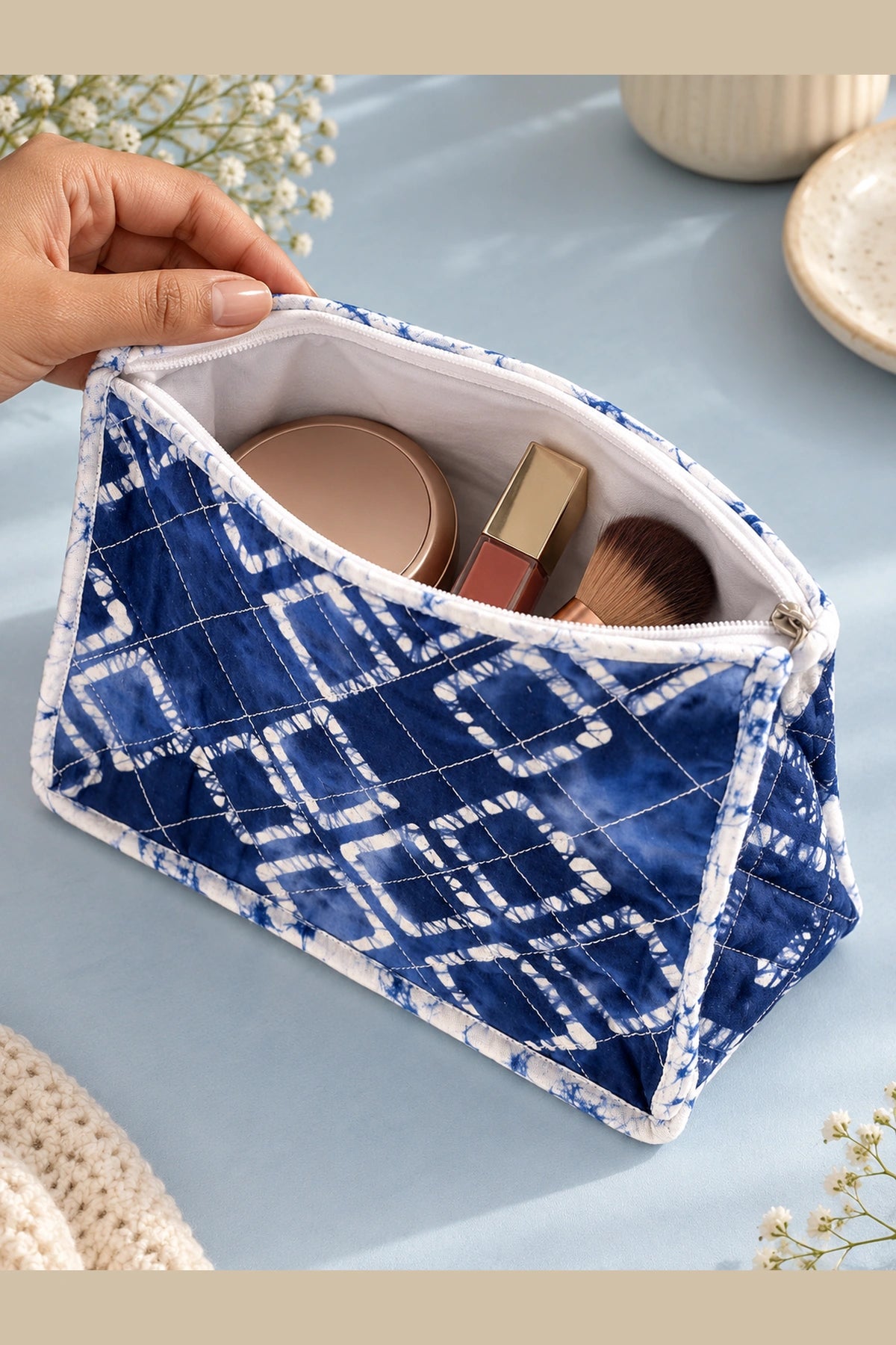 Quilted Batik Makeup Pouch in Blue Shibori Check print – in use, with makeup essentials | Shades of You
