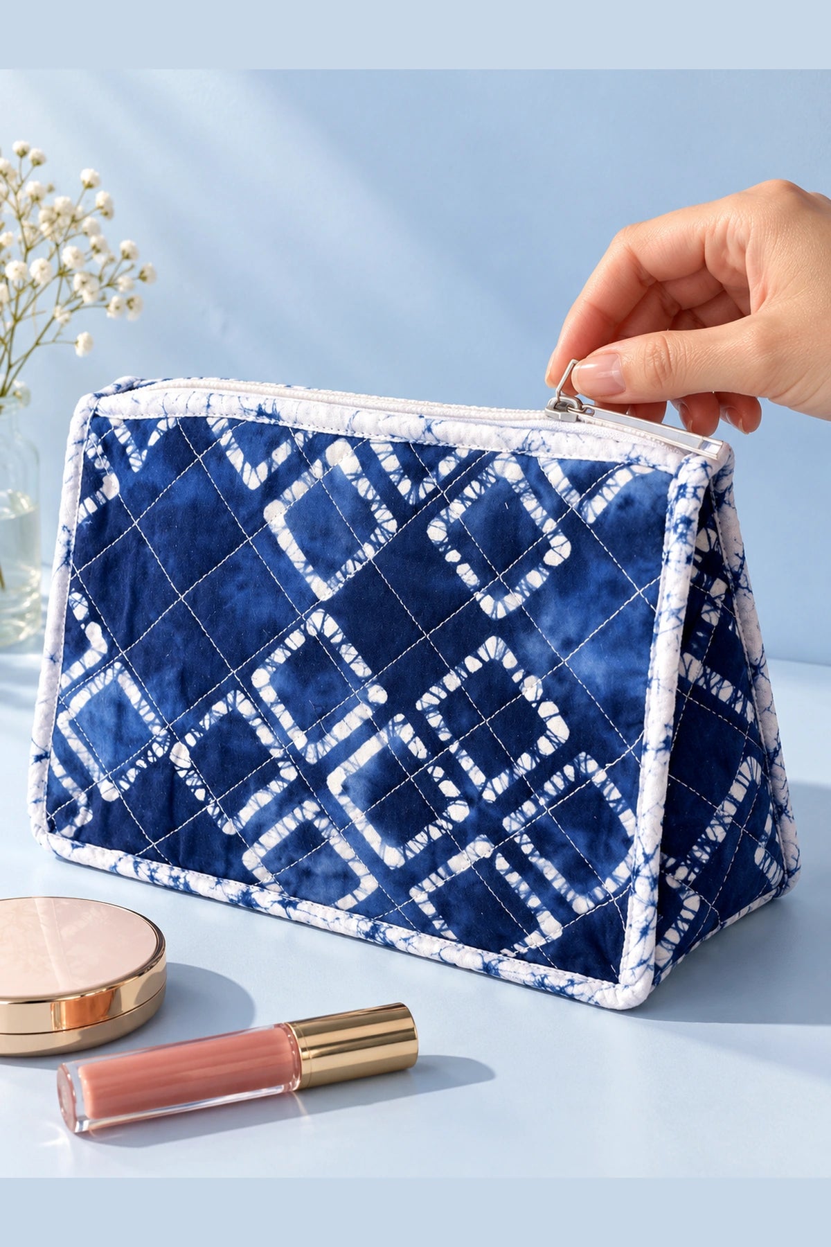 Quilted Batik Makeup Pouch in Blue Shibori Check print – held by the zip | Shades of You