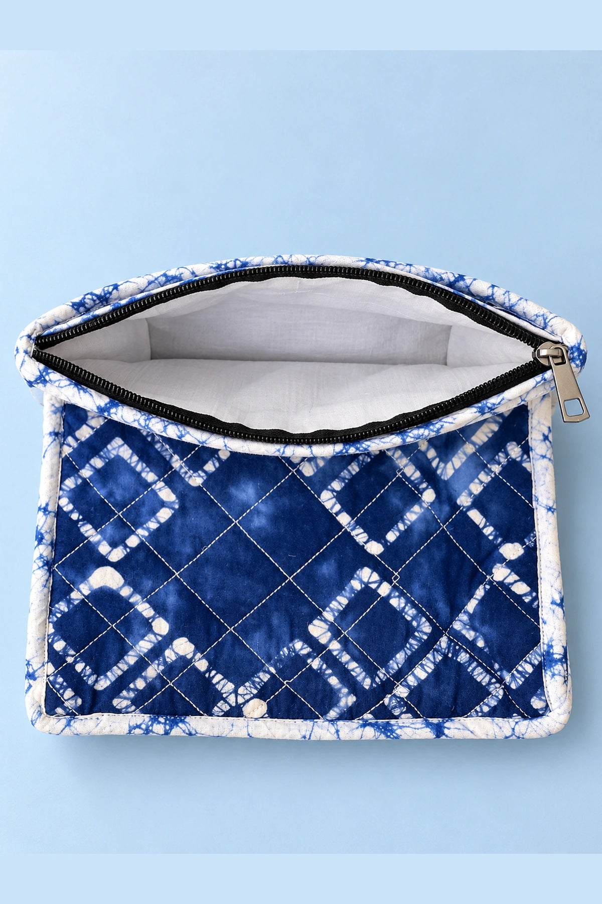 Quilted Batik Utility Pouch in Blue Shibori Check print – open, showing the lined interior | Shades of You