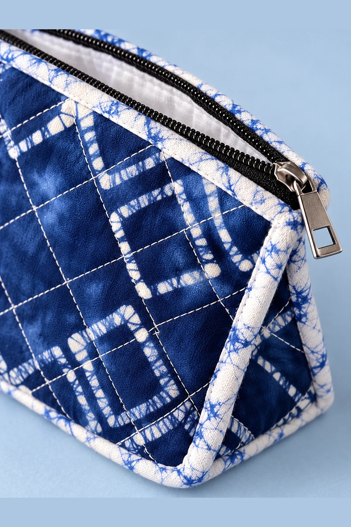 Quilted Batik Utility Pouch in Blue Shibori Check print – close-up of zip and quilted batik | Shades of You