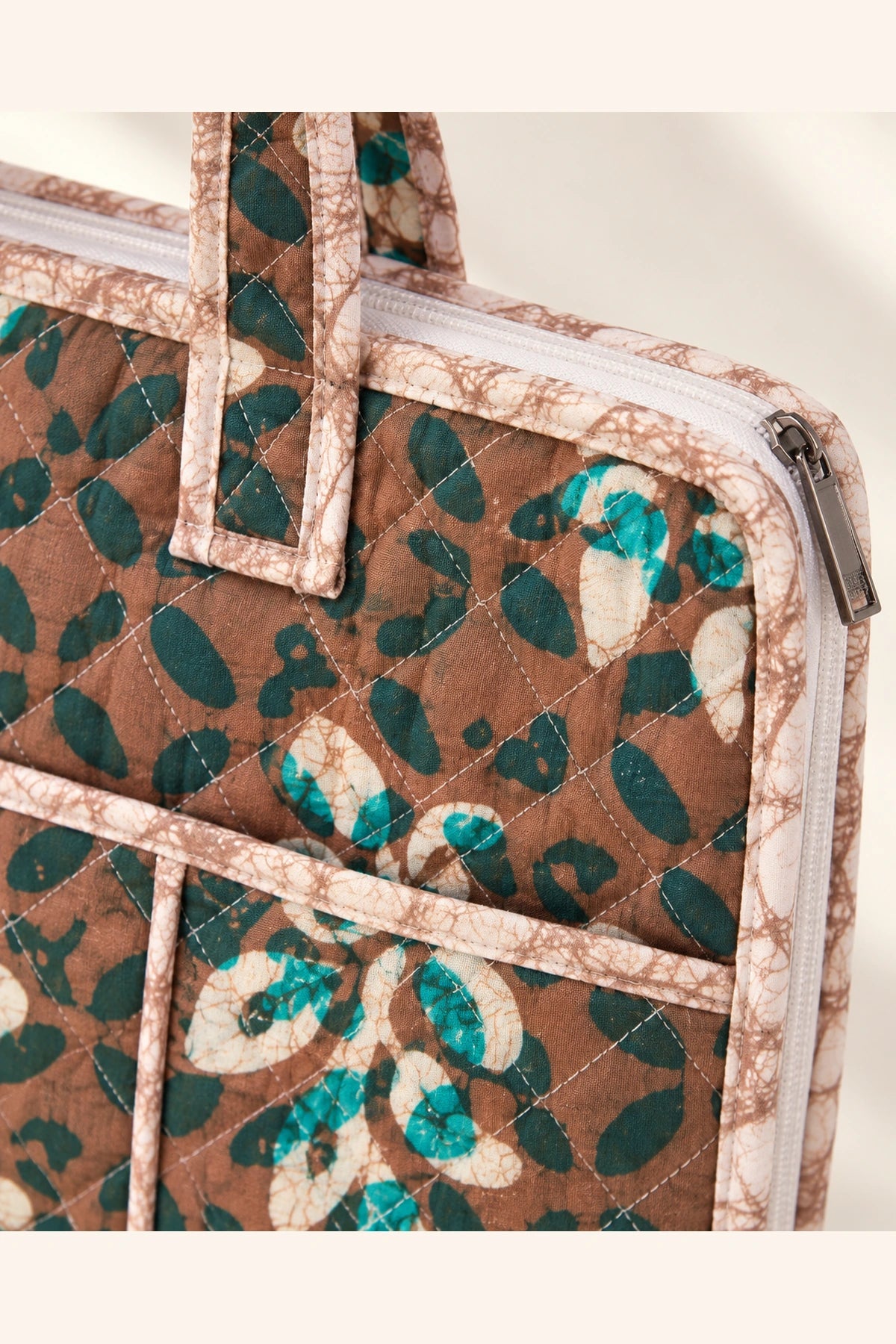 Quilted Batik Laptop Bag in Brown Teal Leaf print – close-up of handle and pocket | Shades of You