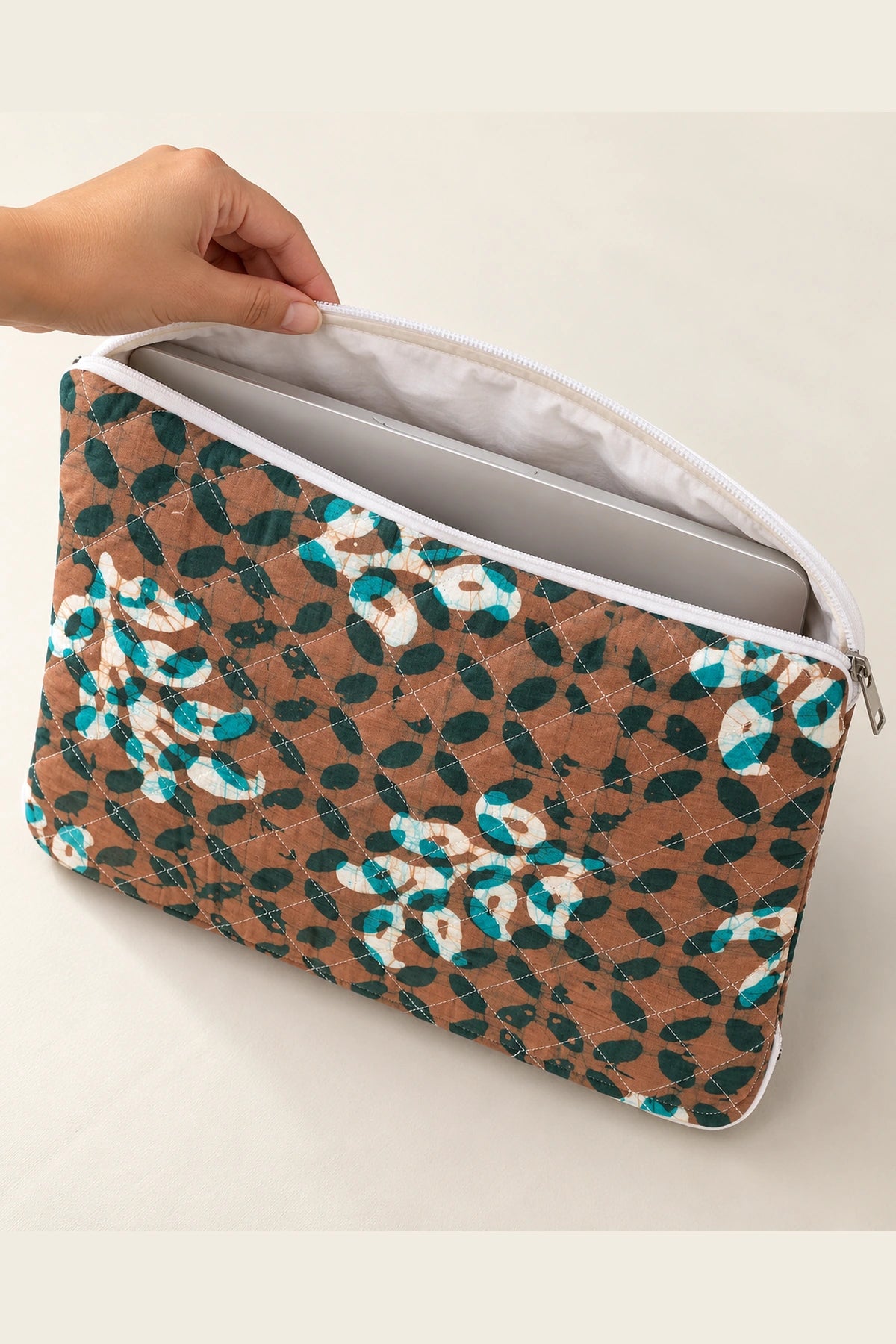Quilted Batik Laptop Sleeve in Brown Teal Leaf print – open, showing the lined interior | Shades of You