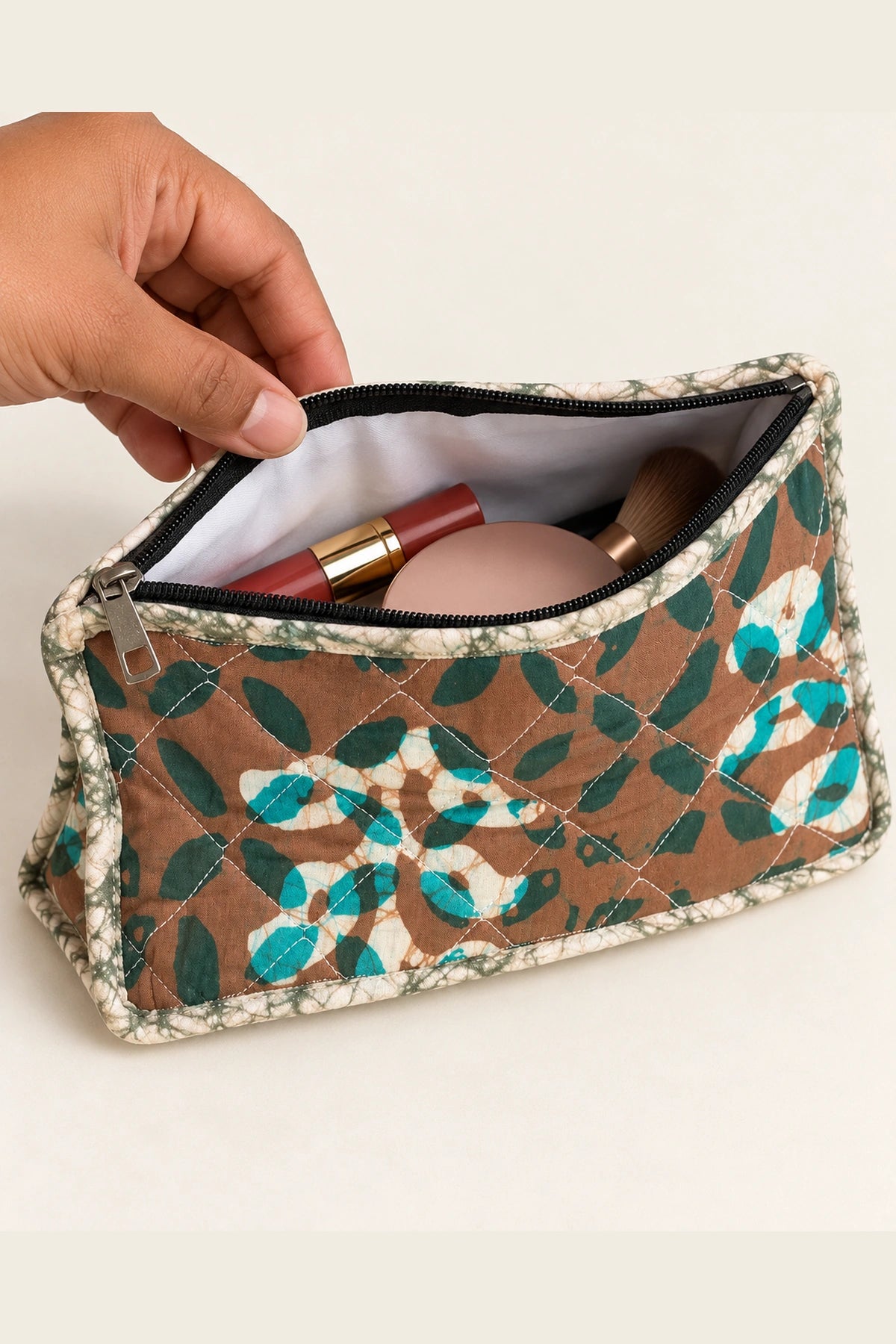 Quilted Batik Makeup Pouch in Brown Teal Leaf print – open, showing the lined interior | Shades of You