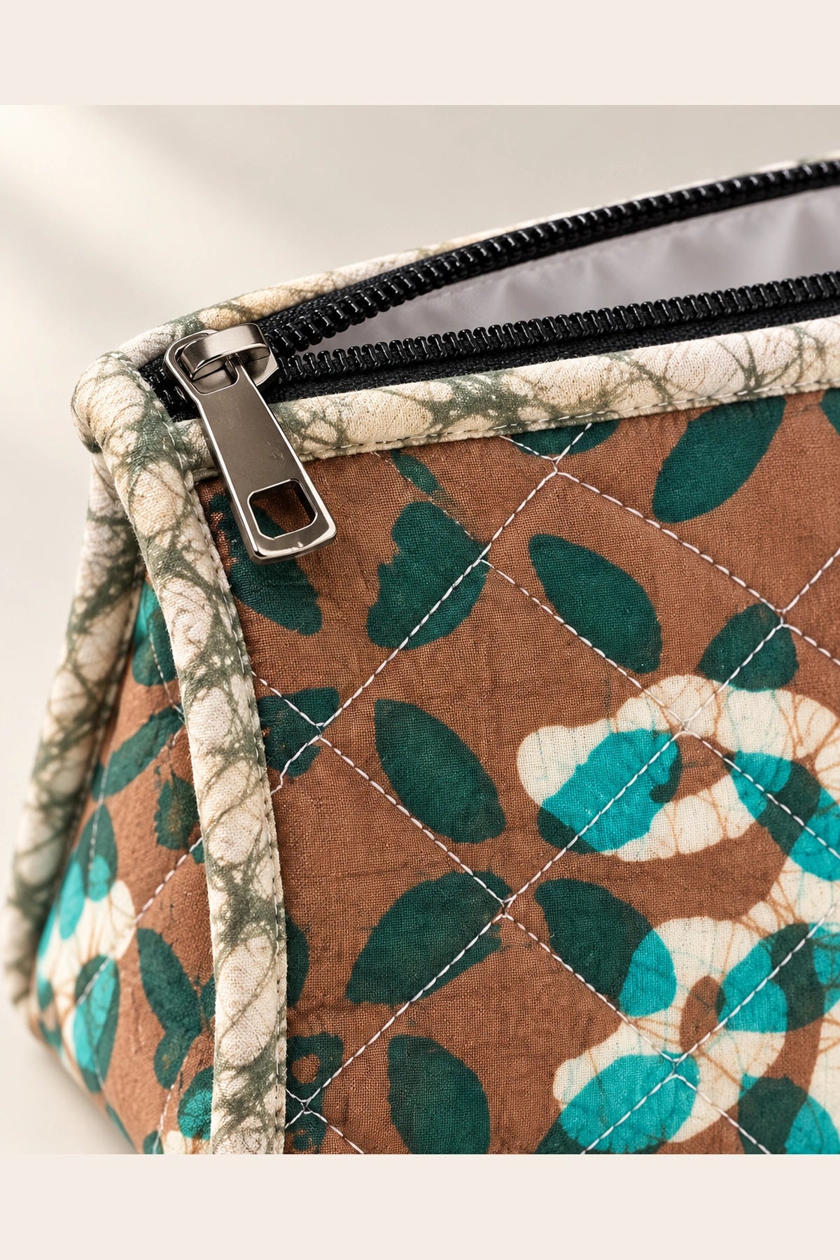 Quilted Batik Makeup Pouch in Brown Teal Leaf print – close-up of zip and quilted batik | Shades of You