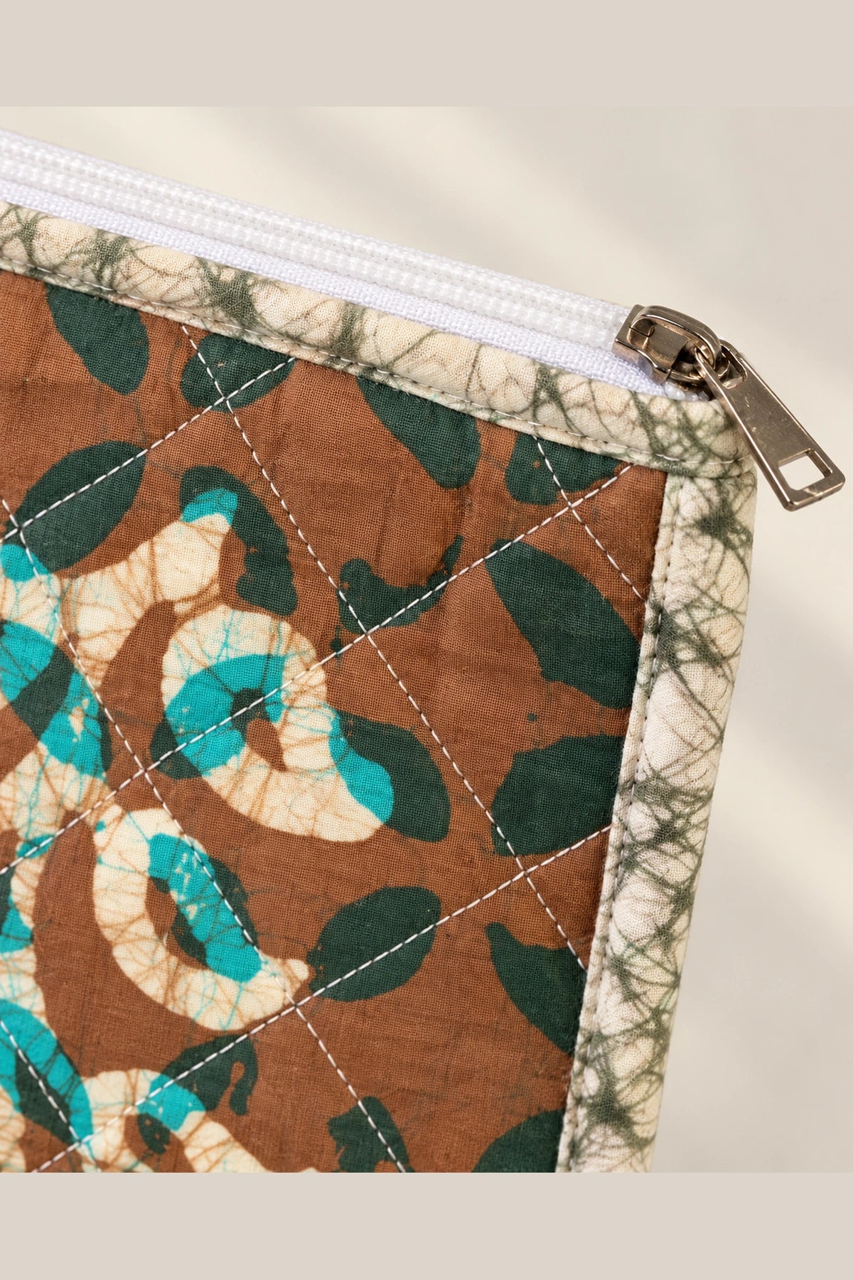 Quilted Batik Utility Pouch in Brown Teal Leaf print – close-up of zip and quilted batik | Shades of You