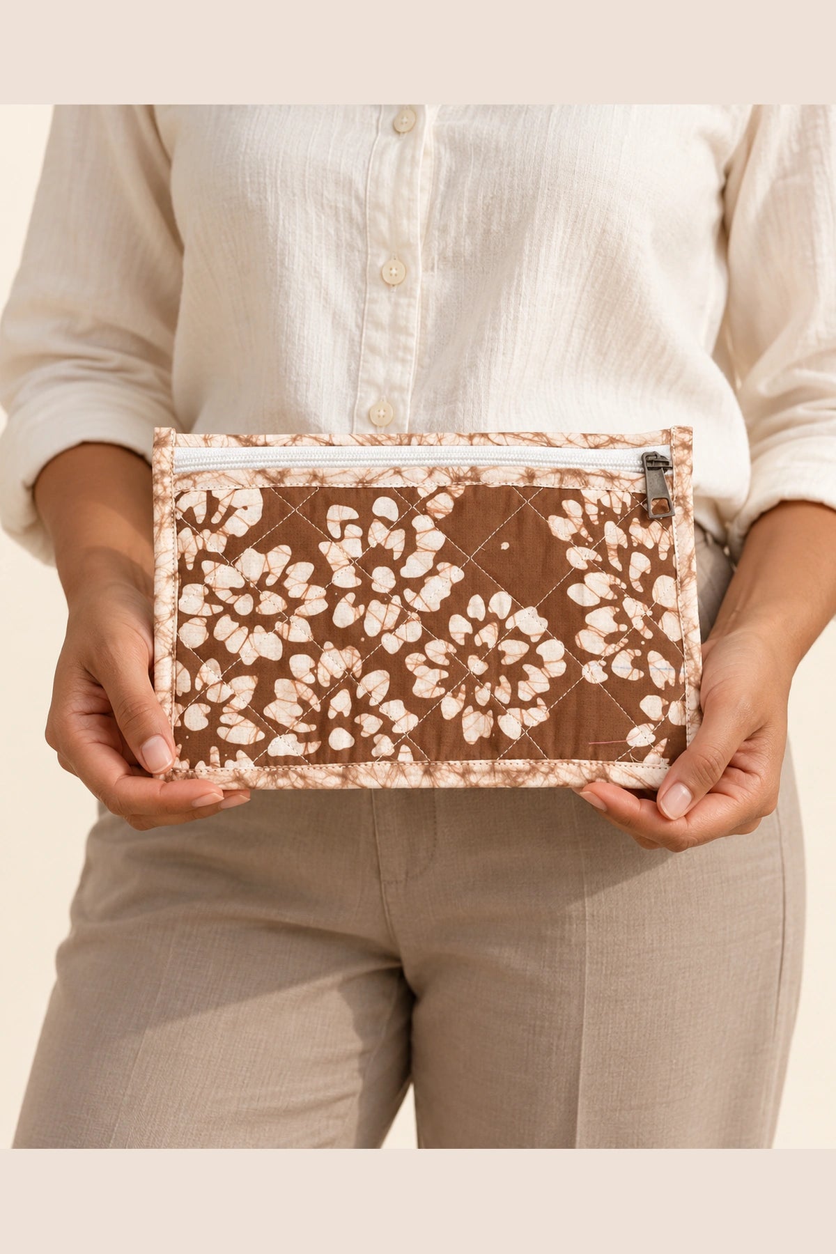 Quilted Batik Small Pouch in Brown White Floral print – held in hand | Shades of You