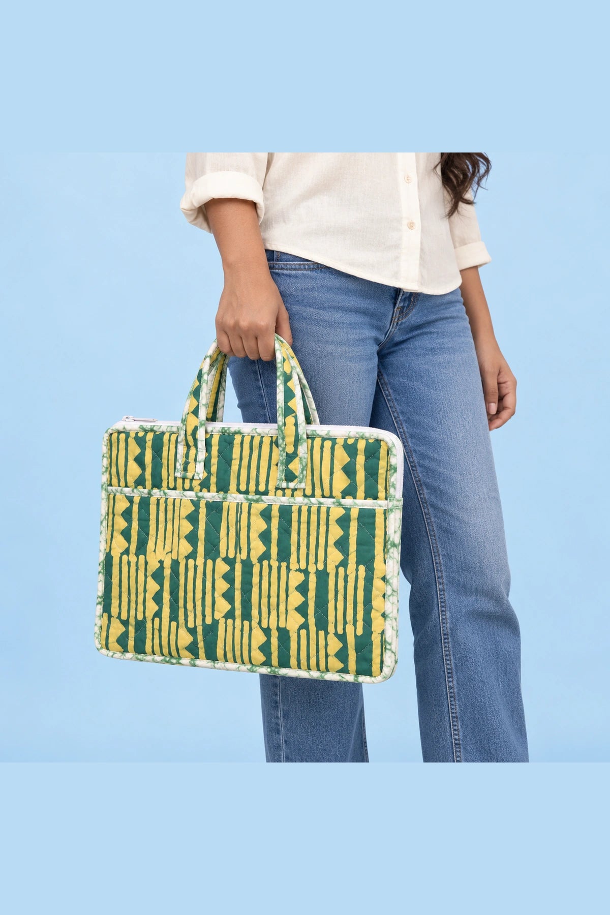 Quilted Batik Laptop Bag in Green Mustard Stripe print – held in hand | Shades of You