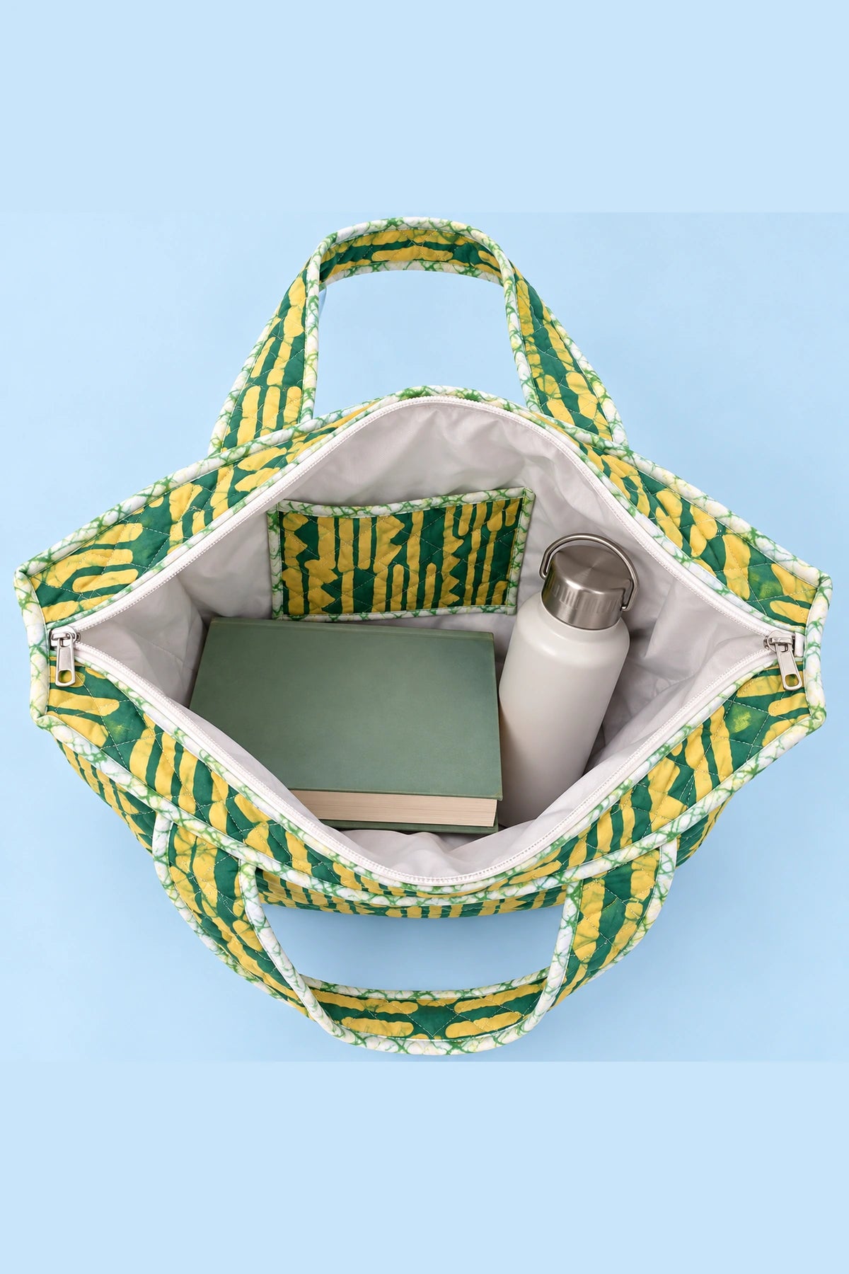Quilted Batik Tote Bag in Green Mustard Stripe print – open, showing the lined interior | Shades of You