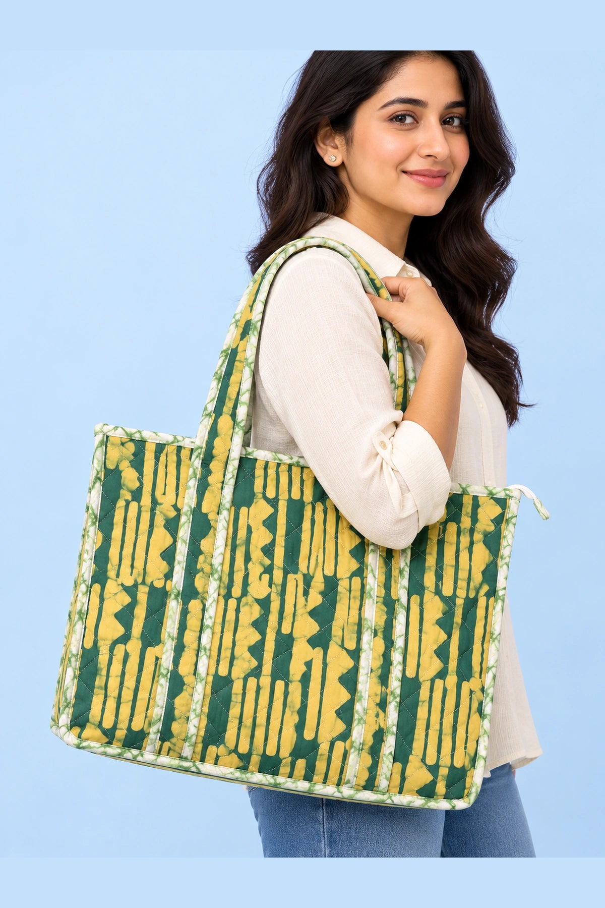Quilted Batik Tote Bag in Green Mustard Stripe print – held in hand | Shades of You