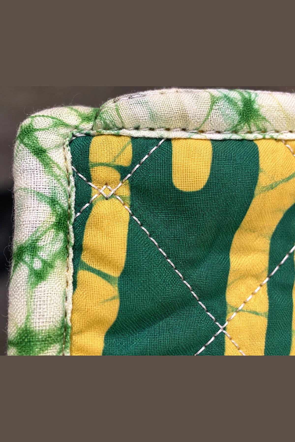 Quilted Batik Utility Pouch in Green Mustard Stripe print – close-up of zip and quilted batik | Shades of You