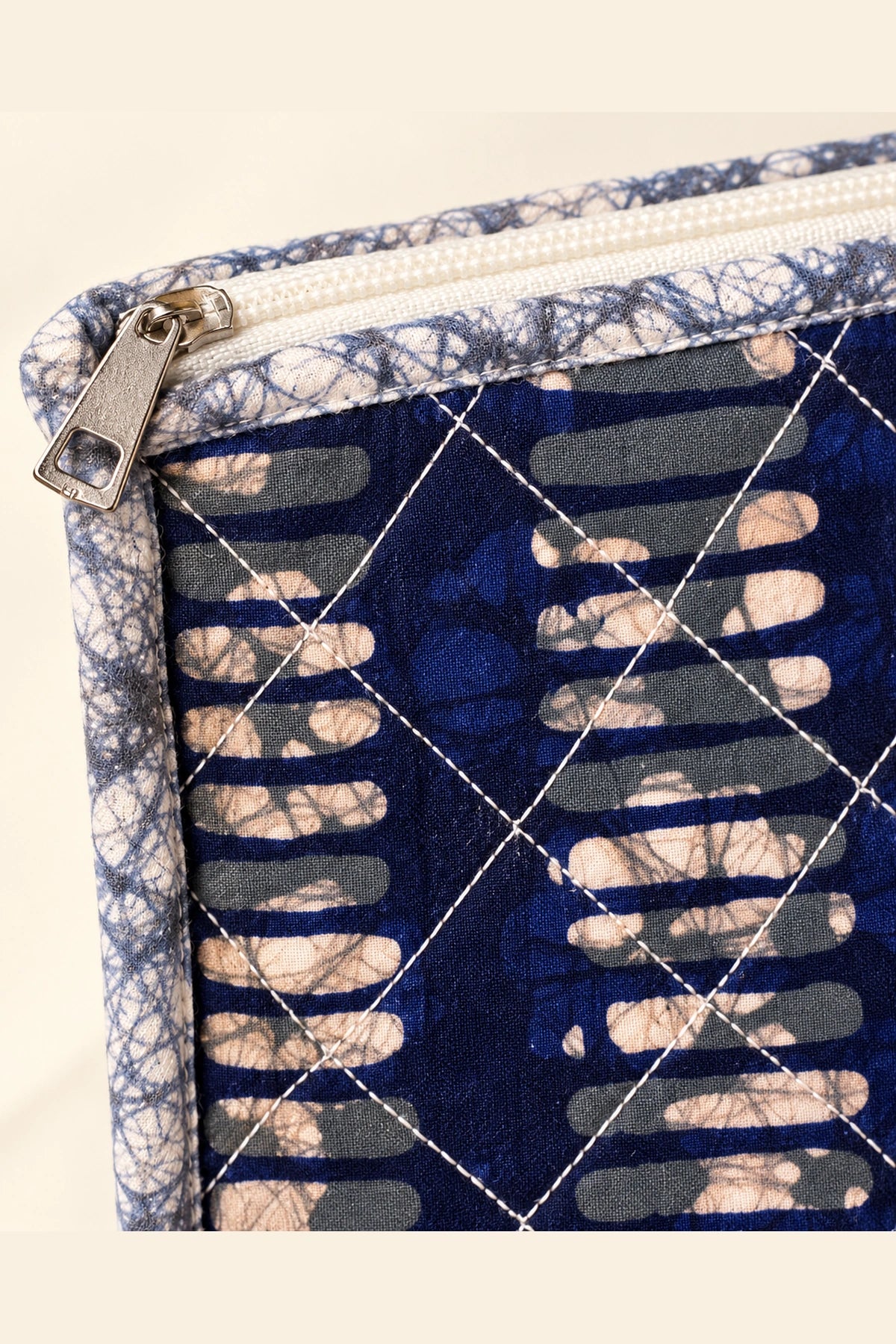 Quilted Batik Utility Pouch in Indigo Ikat Stripe print – close-up of zip and quilted batik | Shades of You