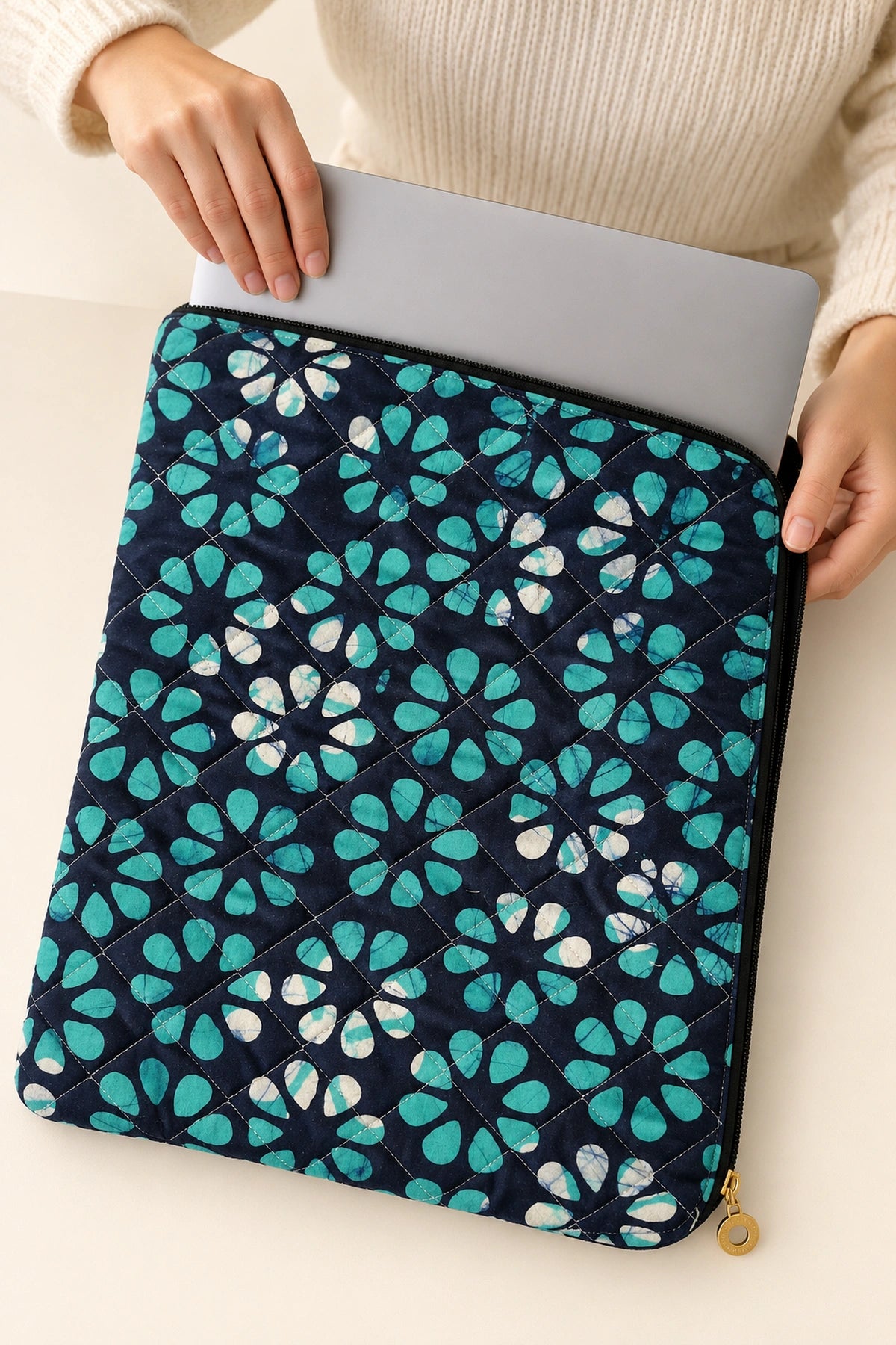 Quilted Batik Laptop Sleeve in Navy Turquoise Floral print – held in hand | Shades of You