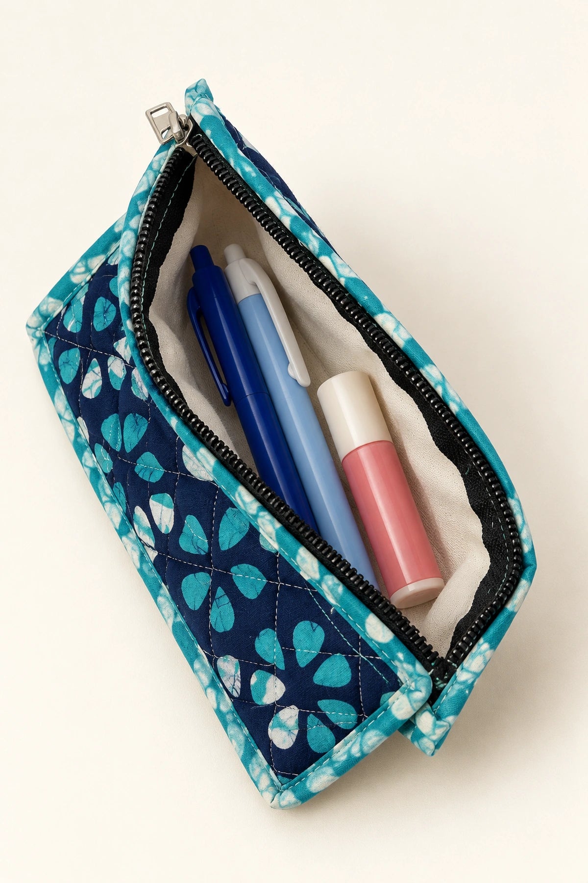 Quilted Batik Small Pouch in Navy Turquoise Floral print – open, showing the lined interior | Shades of You