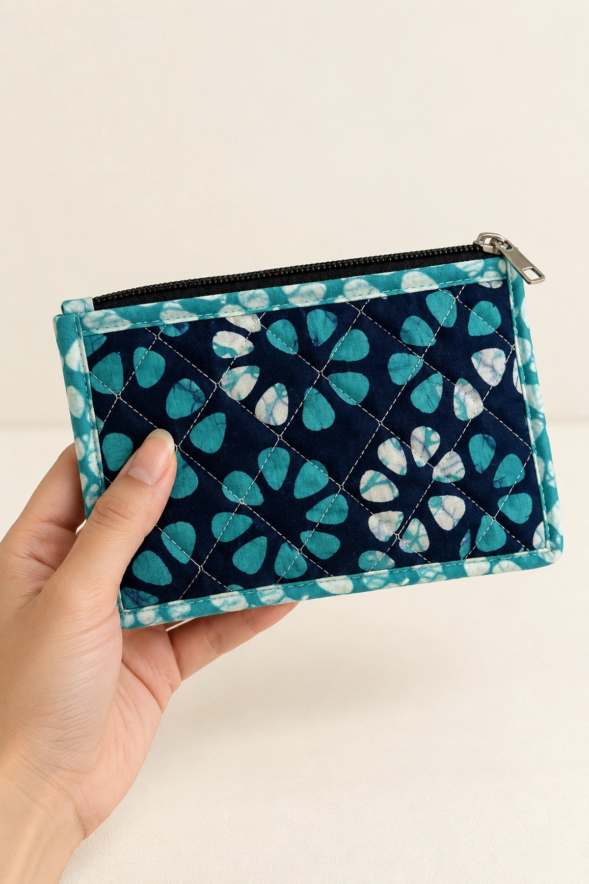 Quilted Batik Small Pouch in Navy Turquoise Floral print – held in hand | Shades of You