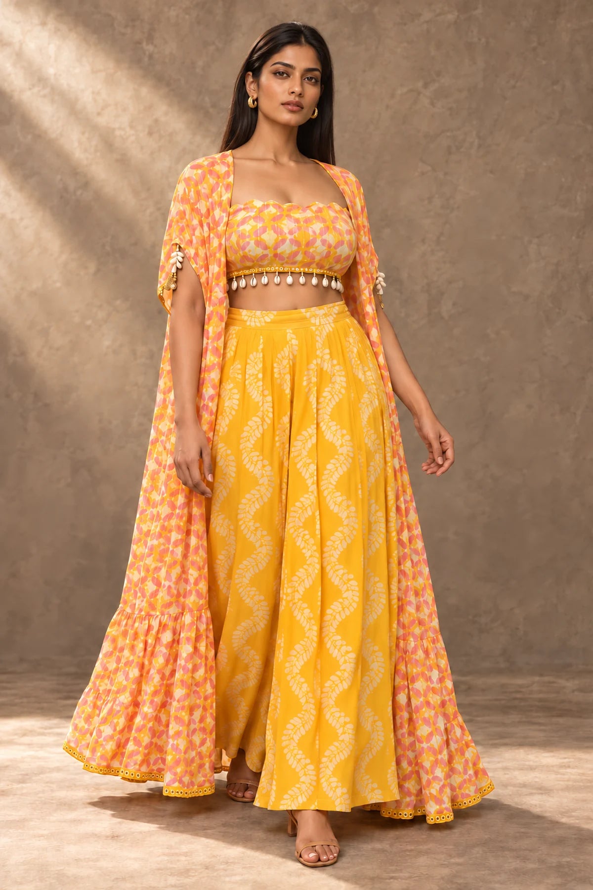 Kesar Saffron Batik Cape & Palazzo Set – front view with scalloped bustier, floor-length cape and yellow palazzos | Handcrafted batik | Shades of You