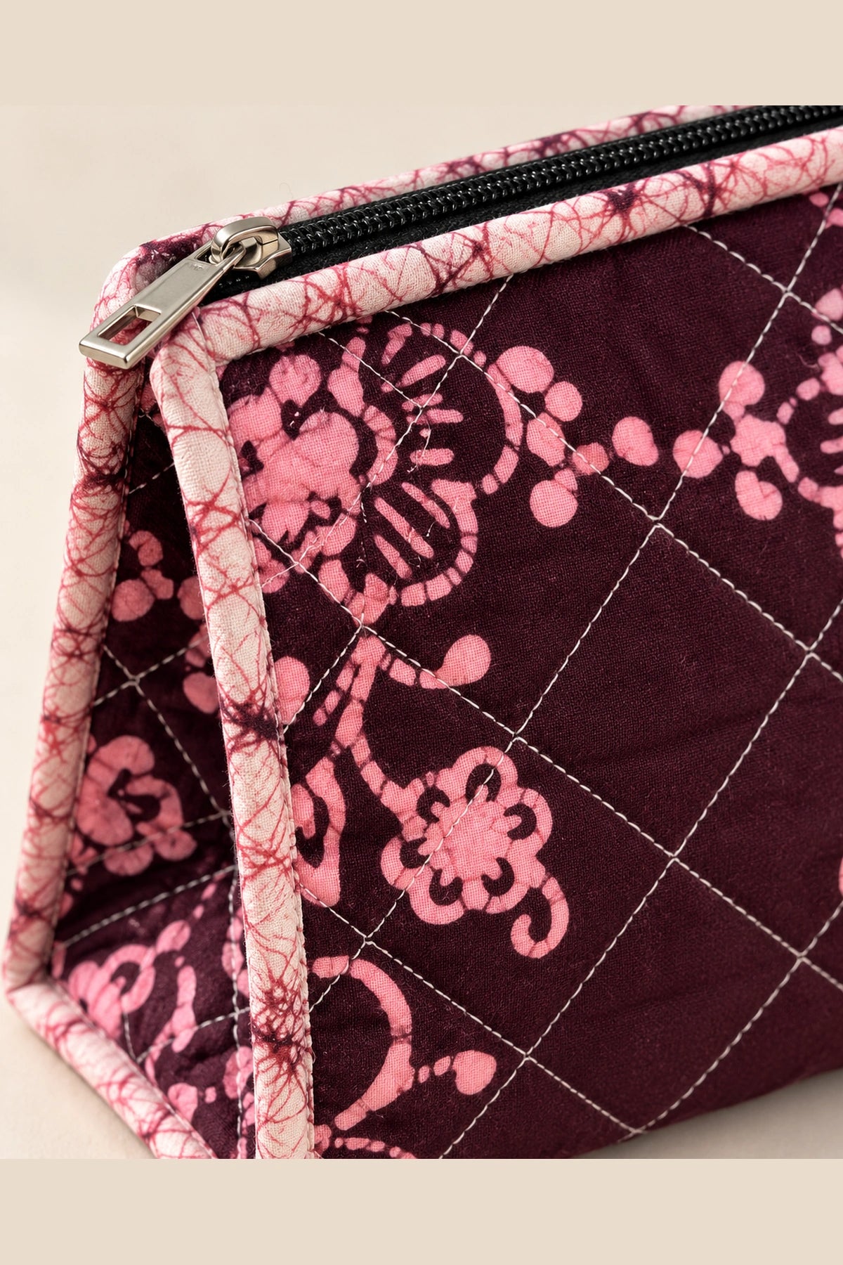 Quilted Batik Makeup Pouch in Wine Pink Floral print – close-up of zip and quilted batik | Shades of You